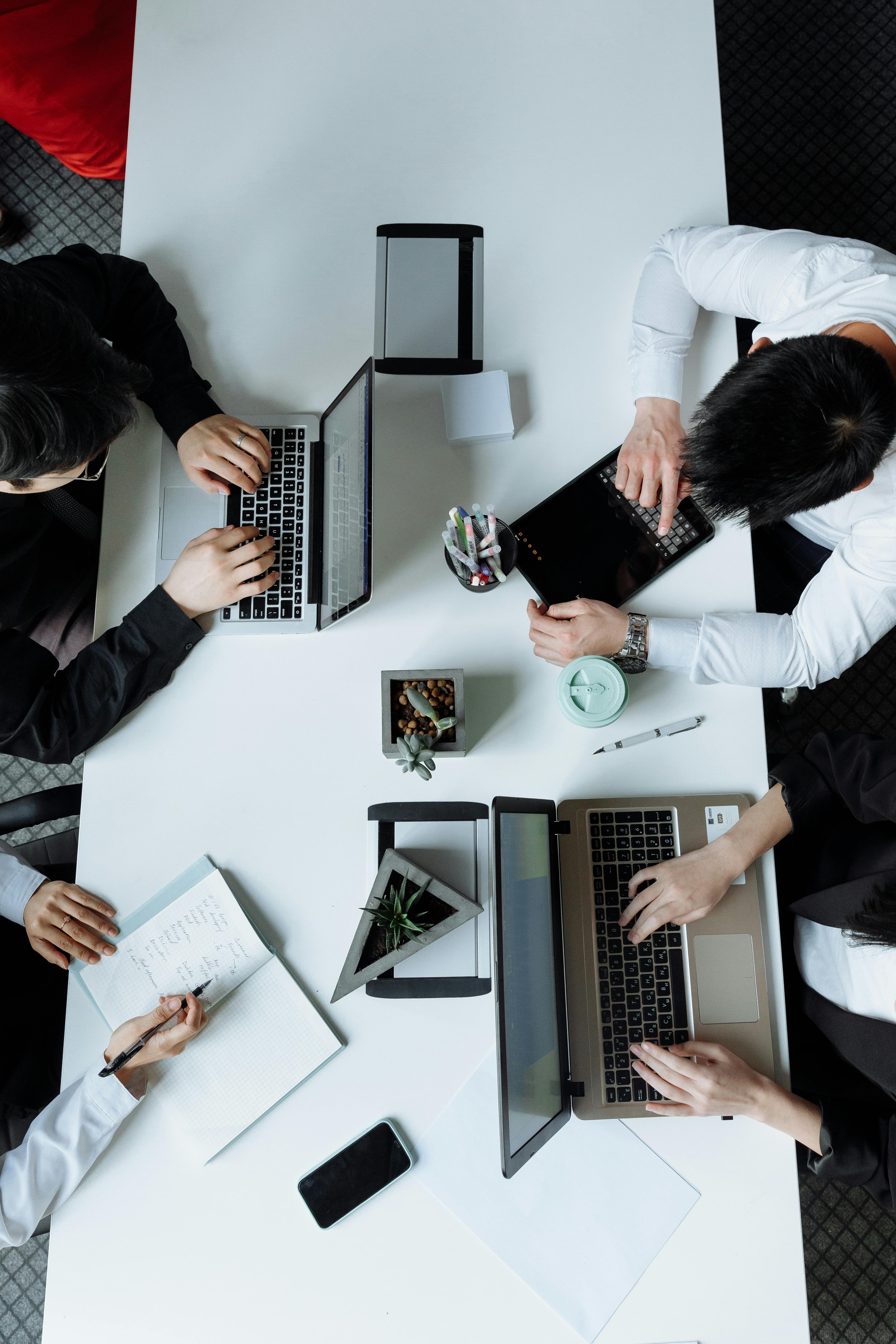 Business handshake over accounting documents